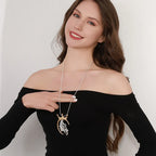 Gold plated statement necklace with large crown pendant