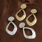 Trendy clip on 3 1/4" large matte gold or silver hammered wide cutout odd shaped earrings - CIVIBUY