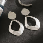 Trendy clip on 3 1/4" large matte gold or silver hammered wide cutout odd shaped earrings - CIVIBUY