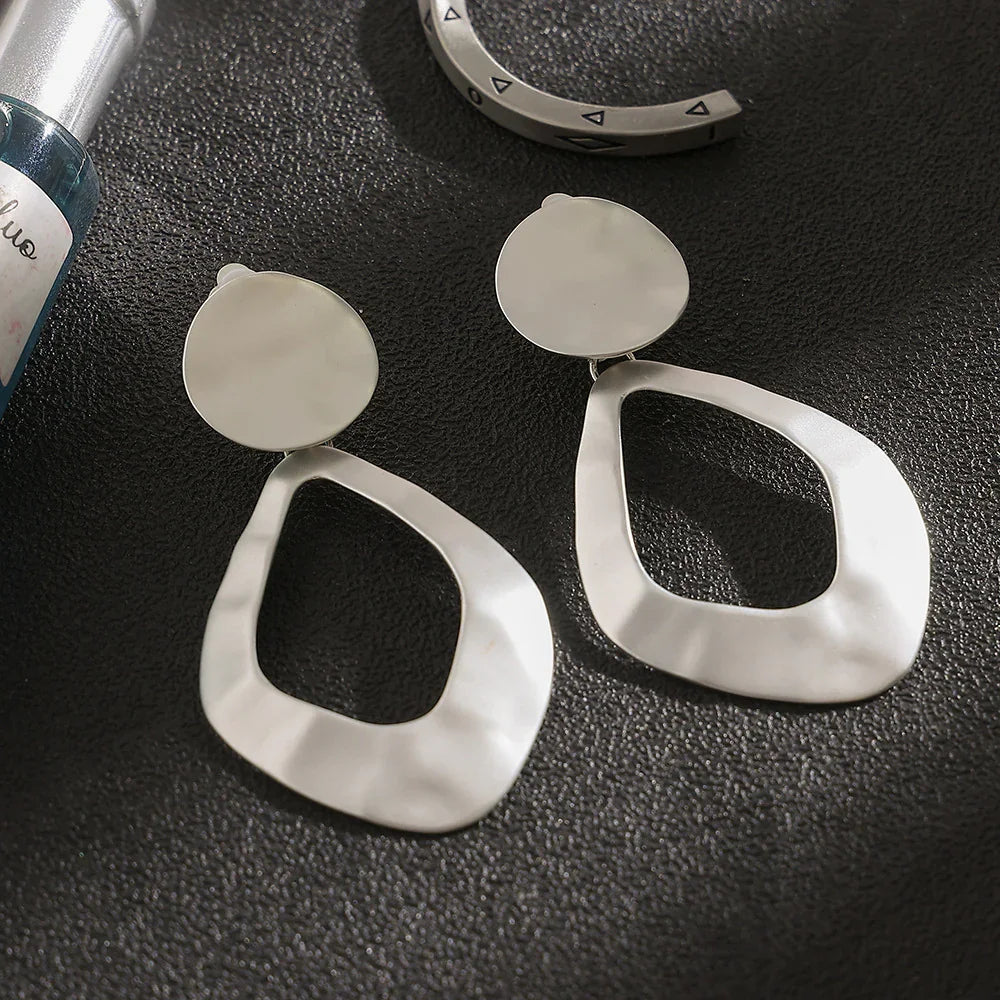 Trendy clip on 3 1/4" large matte gold or silver hammered wide cutout odd shaped earrings - CIVIBUY