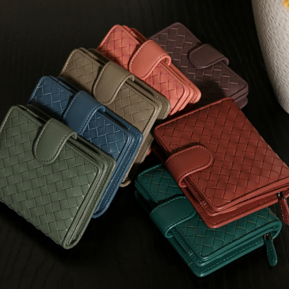 Handcrafted Nappa leather woven wallet in a rich earthy red-brown hue, showing a compact bi-fold design and premium textured