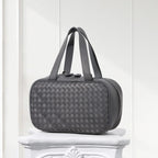 Back view of genuine lambskin woven leather tote – elegant and timeless grey handbag