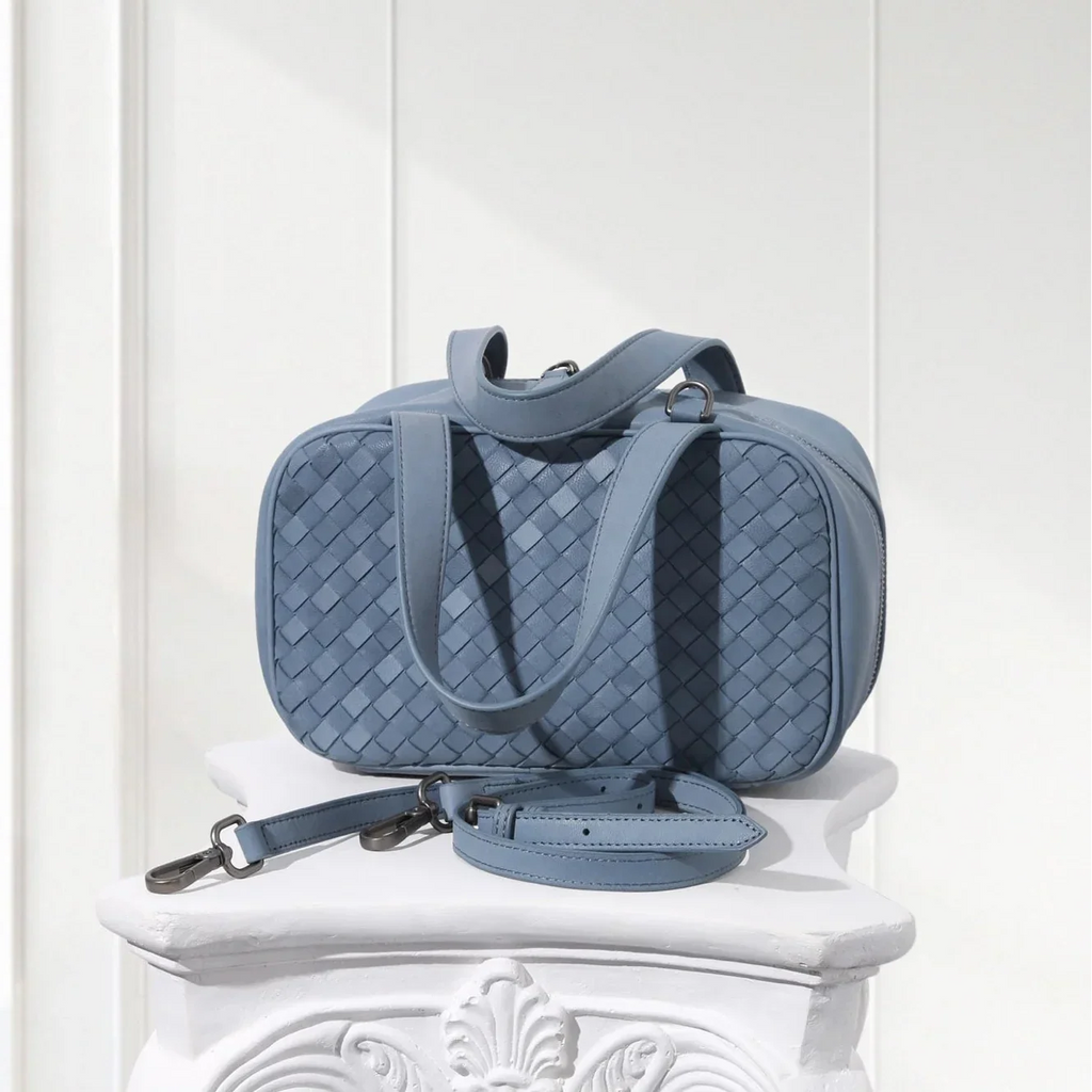Back view of luxury blue leather braided tote bag made from genuine lambskin