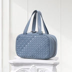 Side view of handcrafted blue woven leather tote – minimalist luxury design