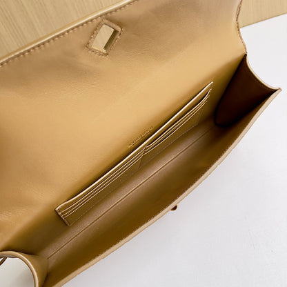 Snag  buttery smooth leather clutch with a top handle bag,lambskin