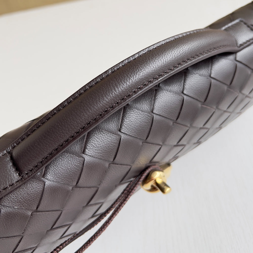 Black Snag  buttery smooth leather clutch with a top handle bag,lambskin