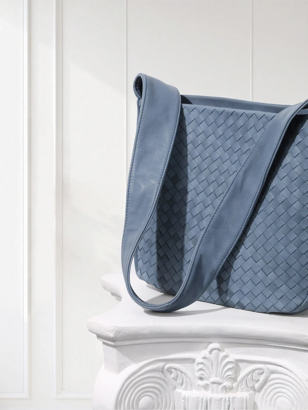 Side view of lightweight woven leather bag showing 60° alternating weave