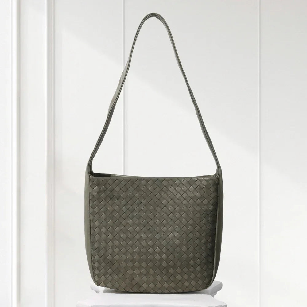 Close-up of aniline-dyed lambskin texture and edge-bound detailing