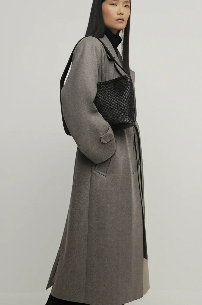 Close-up of aniline-dyed lambskin texture and edge-bound detailing