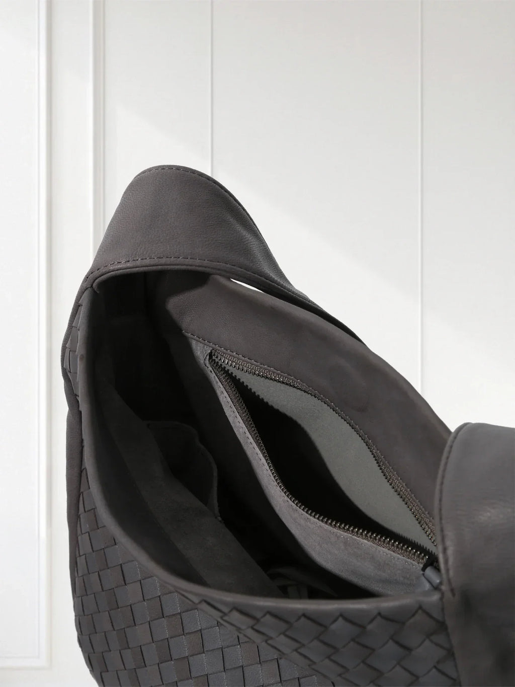 Side view of lightweight woven leather bag showing 60° alternating weave