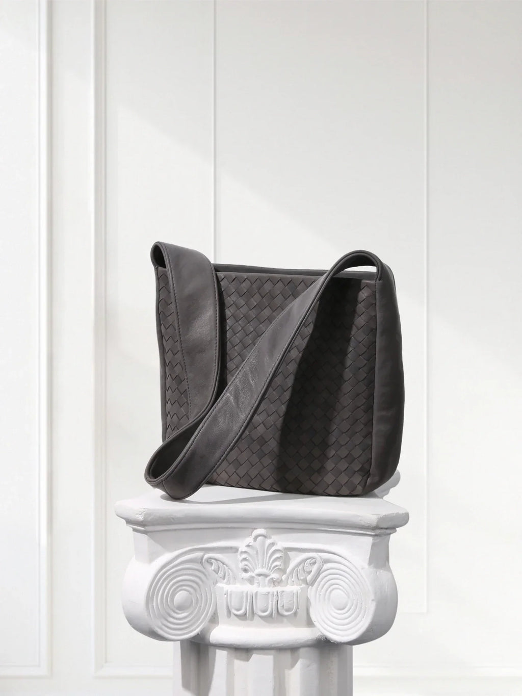 Side view of lightweight woven leather bag showing 60° alternating weave