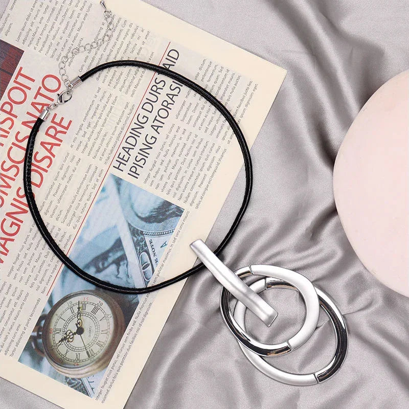 Modern Interlocking Silver Pendant Necklace – minimalist three-ring jewelry with black rubber cord | Civibuy wholesale near New York