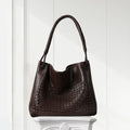 Dark brown woven leather tote bag with braided handle – elegant shoulder purse for women