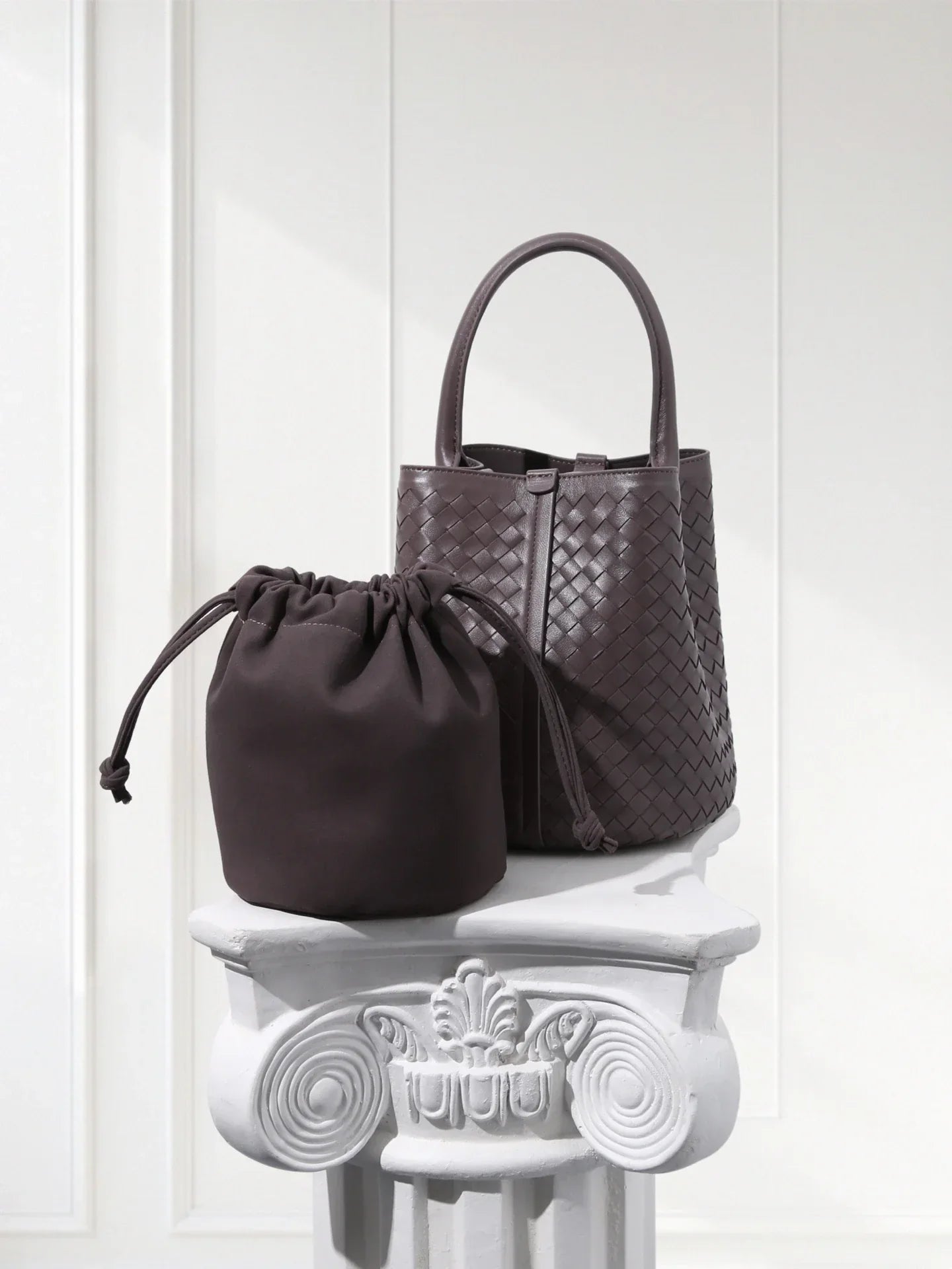 Handcrafted brown woven leather bucket tote with green suede inner bag, 100% lambskin