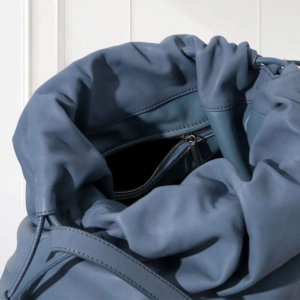 Minimalist Blue leather drawstring shoulder bag – stylish soft tote purse for women, wholesale near New York