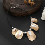 Modern Geometric Choker Necklace – Gold & Silver Statement Pendant on Black Cord,Wholesale