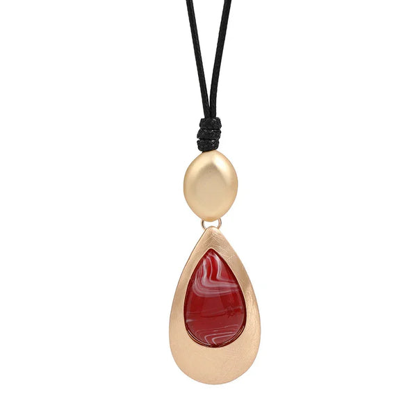 Elegant Teardrop Pendant Necklace with Golden Accent & Red Gemstone