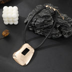 Modern Abstract Pendant Necklace with Geometric Cutout – Gold Finish