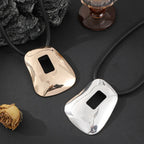 Modern Abstract Pendant Necklace with Geometric Cutout – Gold Finish