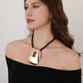 Modern Abstract Pendant Necklace with Geometric Cutout – Gold Finish