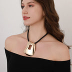 Modern Abstract Pendant Necklace with Geometric Cutout – Gold Finish