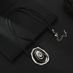 Futuristic Layered Pendant Necklace with Clear Crystal Center – Silver & Black Tones