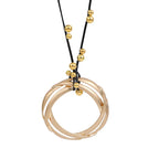 Gold Interlocking Circle Pendant Necklace with Beaded Accents
