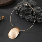 Golden Essence: Modern Oval Choker Necklace