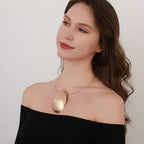 Golden Essence: Modern Oval Choker Necklace