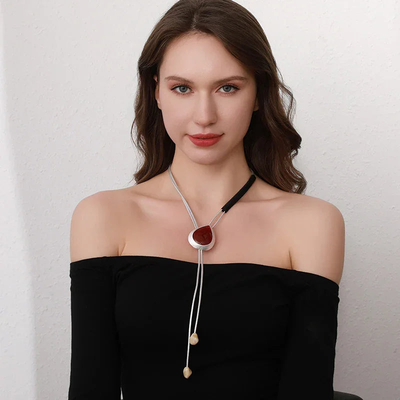 Modern Boho Statement Necklace with Red Resin Pendant and Adjustable Leather Cord