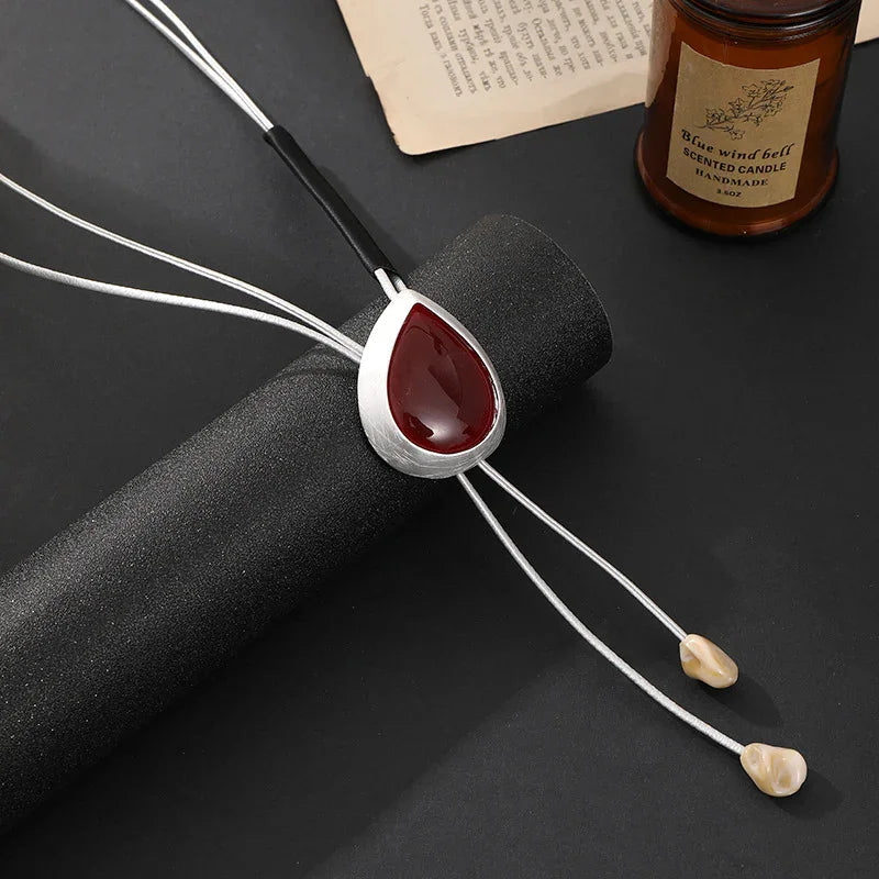 Modern Boho Statement Necklace with Red Resin Pendant and Adjustable Leather Cord