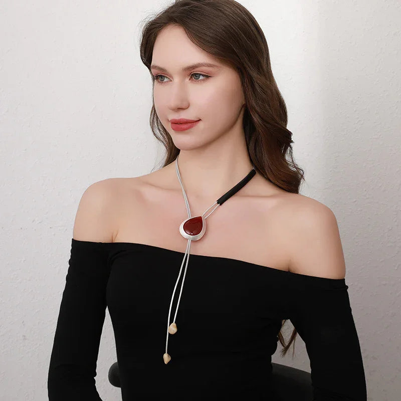 Modern Boho Statement Necklace with Red Resin Pendant and Adjustable Leather Cord