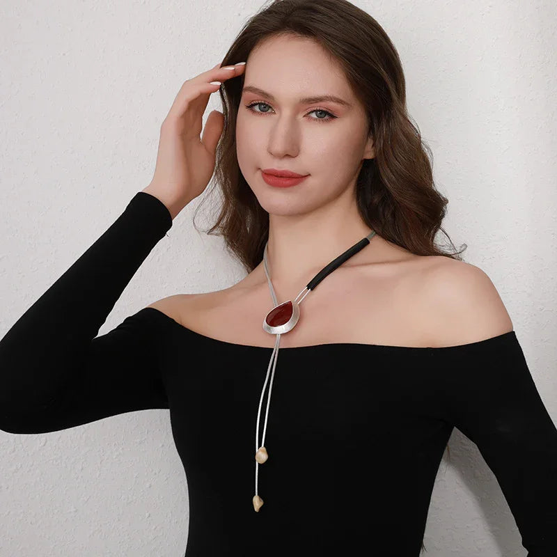 Modern Boho Statement Necklace with Red Resin Pendant and Adjustable Leather Cord