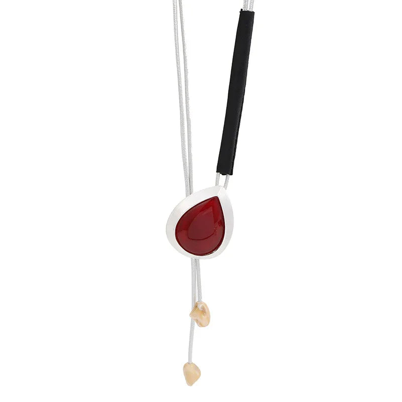 Modern Boho Statement Necklace with Red Resin Pendant and Adjustable Leather Cord