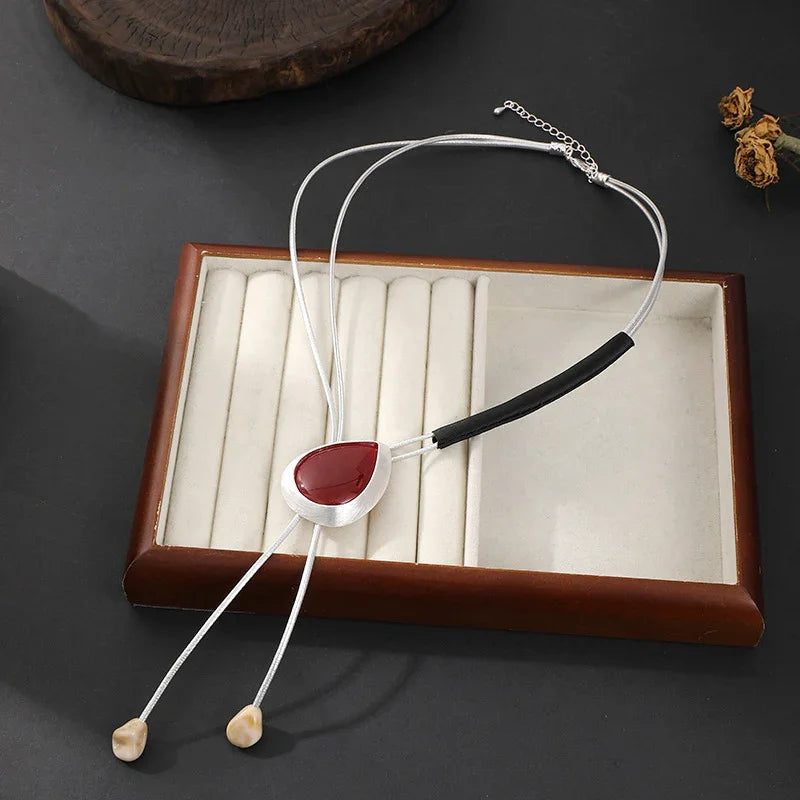 Modern Boho Statement Necklace with Red Resin Pendant and Adjustable Leather Cord