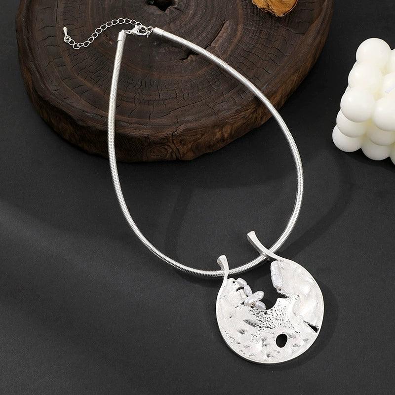 Bold gold pendant silver necklace with round artistic design and pearl accents – women’s fashion jewelry near New York, shop civibuy.com