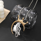 Gold plated statement necklace with large crown pendant