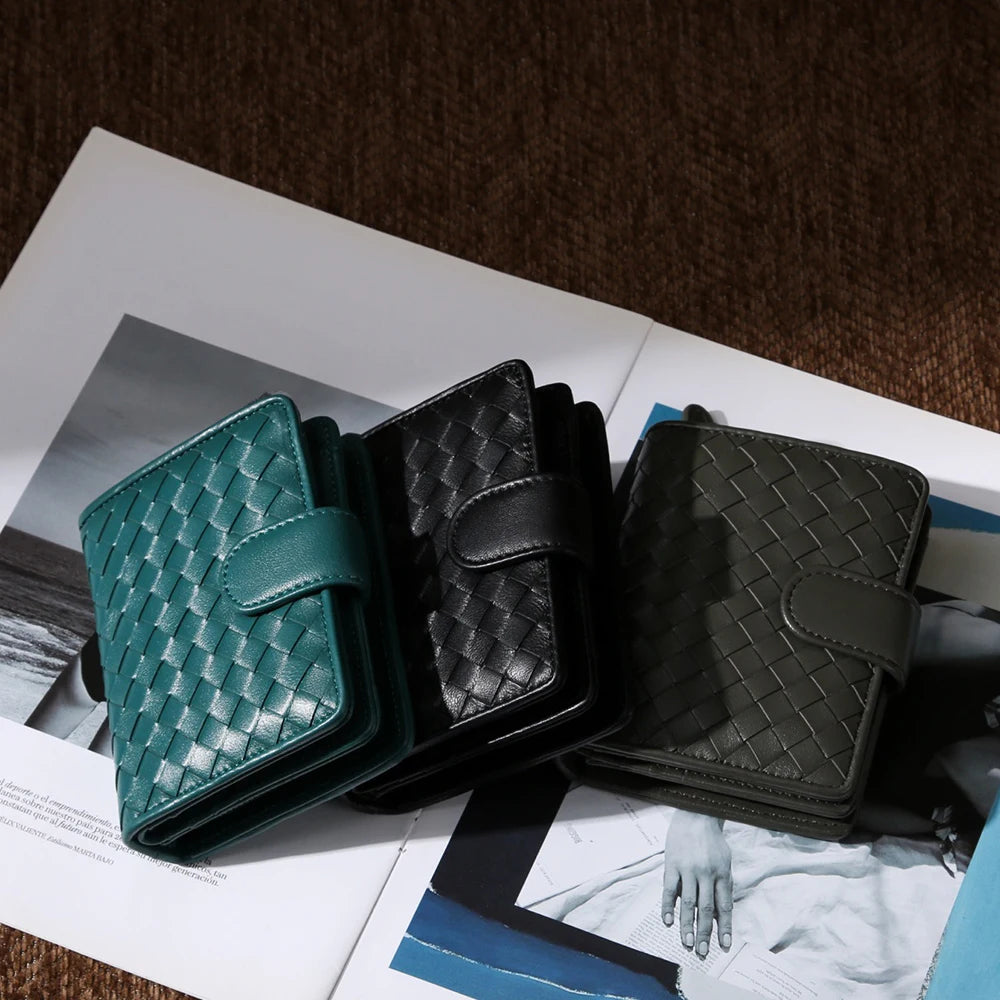 Handcrafted Nappa leather woven wallet in a rich earthy red-brown hue, showing a compact bi-fold design and premium textured