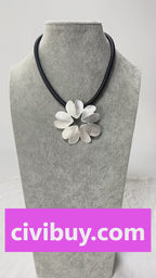 Gold plated statement necklace with large flower pendant