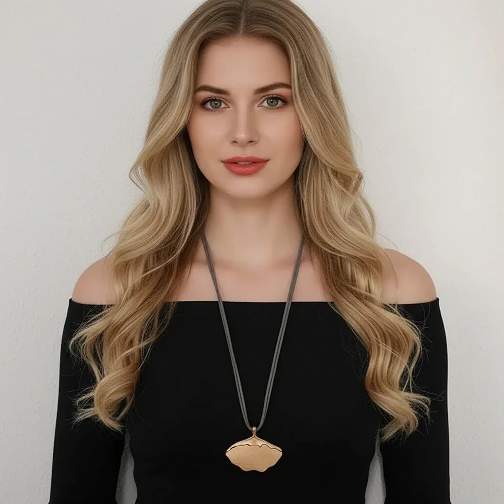 Gold leaf pendant necklace on leather cord – stylish autumn winter fashion jewelry, wholesale available near Clearwater FL